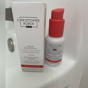 New Christopher Robin regenerating hair serum with make up bag